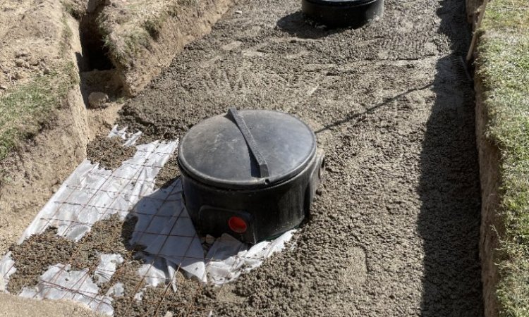 Pose et installation de cuve de récupération d'eau pluviale et création d'un puisard à Pont sur Yonne 