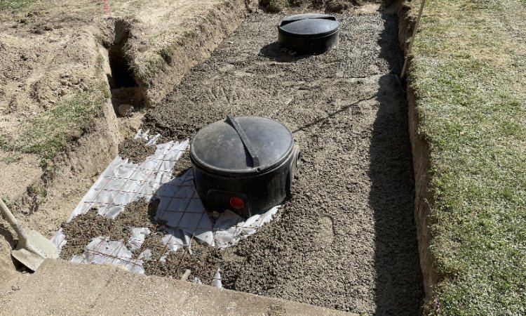 Pose et installation de cuve de récupération d'eau pluviale et création d'un puisard à Pont sur Yonne 